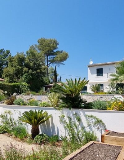 View of the villa’s multi-level terraces surrounded by Mediterranean vegetation
