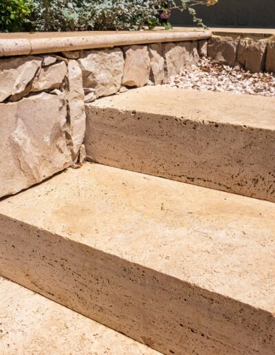 Natural stone steps leading to the different levels of the garden